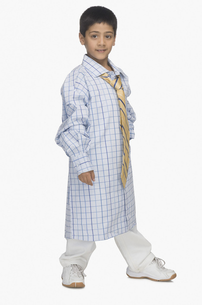 Boy wearing oversized shirt and tie - Fotoğraf, Görsel