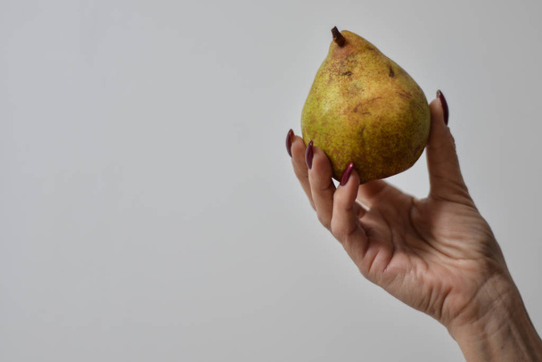  fruit in hand on background - Zdjęcie, obraz