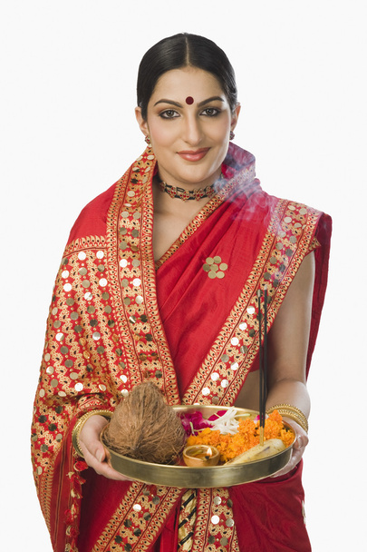 Woman holding religious offering - Photo, image
