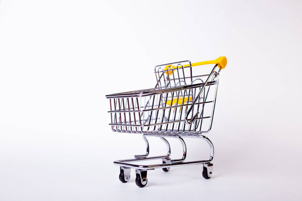 Shopping cart concept of shopping and sales, retail and shops. - Foto, immagini