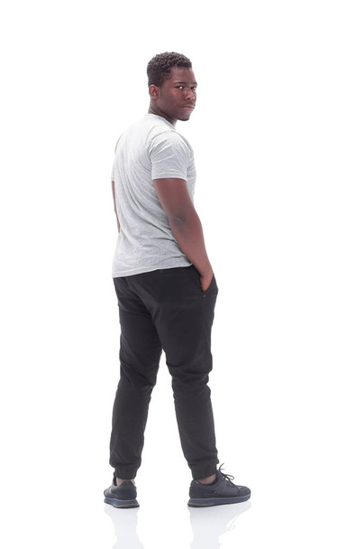 rear view. young man looking at white blank screen. - Photo, Image