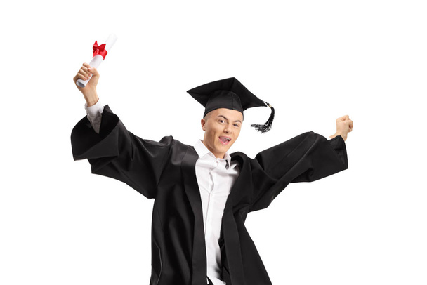 Happy male graduate student with a diploma jumping - Zdjęcie, obraz