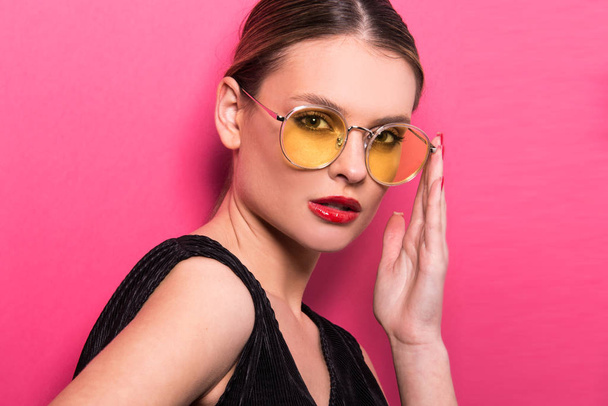 Portrait of beautiful model with close up glasses. Young woman, brunette girl with sunglasses, isolated, commercial poster  ready, studio  - Photo, Image