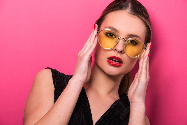 Portrait of beautiful model with close up glasses. Young woman, brunette girl with sunglasses, isolated, commercial poster  ready, studio  - Zdjęcie, obraz