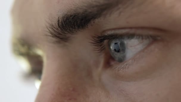 Close-up reflection of the computer monitor in the mans eyes - Footage, Video