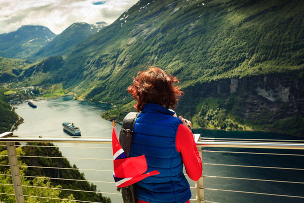 Tourist taking photo of fjord landscape, Norway - Zdjęcie, obraz