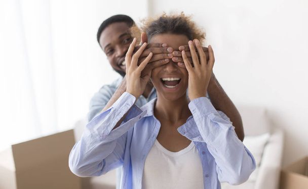 Joyful Man Covering Girlfriends Eyes Showing Their New Home - Foto, Imagem