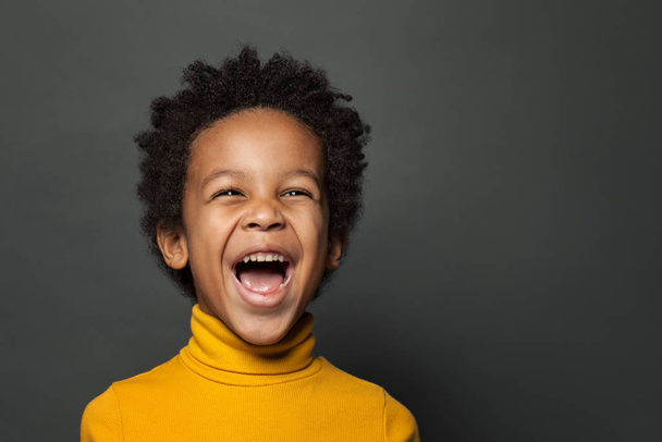 Little boy black child laughing. Closeup portrait - Zdjęcie, obraz