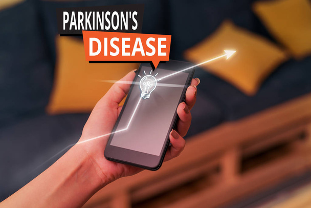 Texto manuscrito Parkinson S es enfermedad. Trastorno conceptual del sistema nervioso fotográfico que afecta el movimiento
 - Foto, imagen