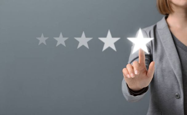 Hand of Client pressing Five Star Excellent survey Rating - Photo, Image