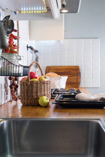 White kitchen interior Grocery product apple basket - Foto, Imagen