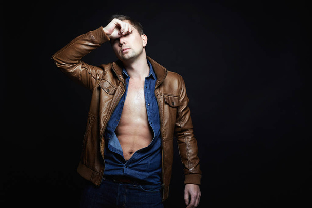 Man in leather coat. stylish sexy Handsome Boy - Foto, immagini