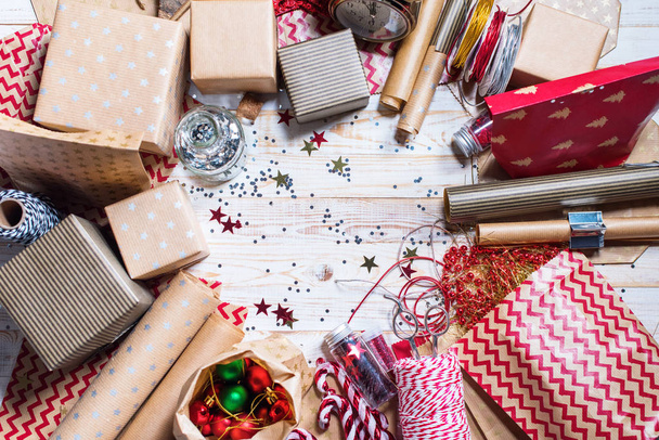 Christmas card with stripped, red, beige, presents - Фото, зображення