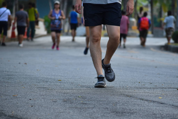 Thailand. Bangkok. January 2020. Street athletes in Asia. People Jogging in Park. Active sport in Thailand. Healthy way of life. - Valokuva, kuva