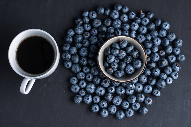 Blueberry antioxidant organic superfood in ceramic bowl concept for healthy eating and nutrition - Valokuva, kuva