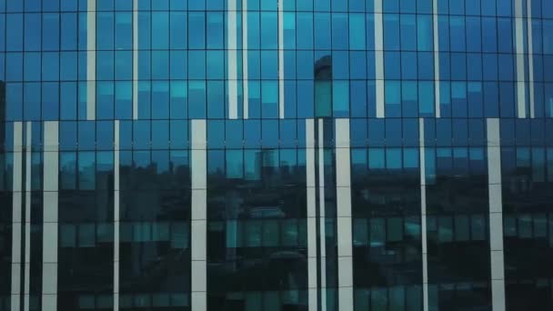 Aerial view of close up of a skyscraper, Business building close up Aerial, Flight near a glass skyscraper, Impressive skyscrapers from drone - Imágenes, Vídeo