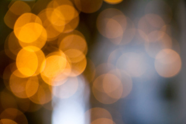 Christmas background with blurry lights, New Year or holiday concept. - Foto, Imagen