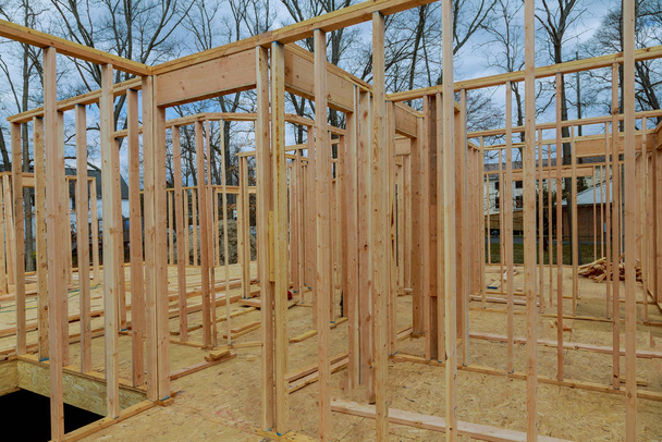 New construction home residential construction home framing against a blue sky - Photo, Image