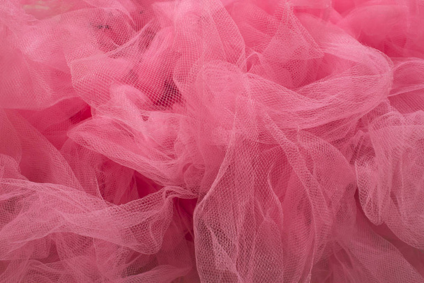 This is a photograph of Pink Tulle Tutu closeup background - Photo, Image