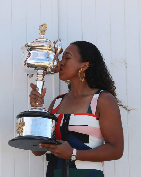 MELBOURNE, AUSTRALIA - JANUARY 27, 2019: 2 times Grand Slam Champion Naomi Osaka of Japan posing with Australian Open trophy at Brighton Beach in Melbourne after her victory at 2019 Australian Open - Valokuva, kuva