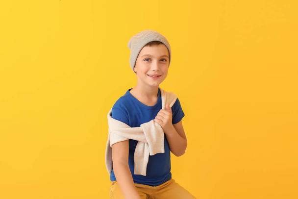 Cute fashionable boy on color background - Photo, Image