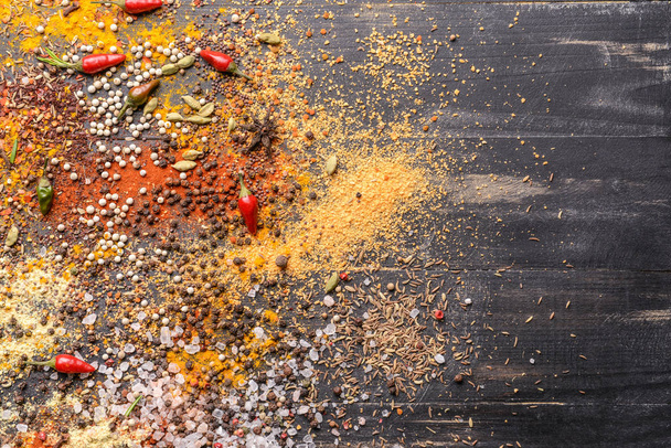 Mix of different spices on dark background - Foto, immagini