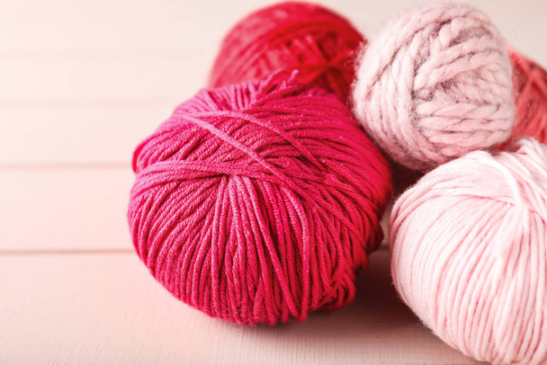 Knitting yarn on white table - Zdjęcie, obraz