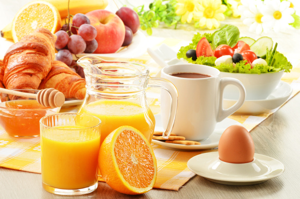 Breakfast with coffee, orange juice, croissant, egg, vegetables - Photo, Image