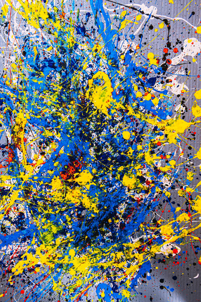 abstract expressonism. Picture painted using the technique of dripping. Mixing different colors red yellow blue white black. Vertcal orientation. - Photo, Image