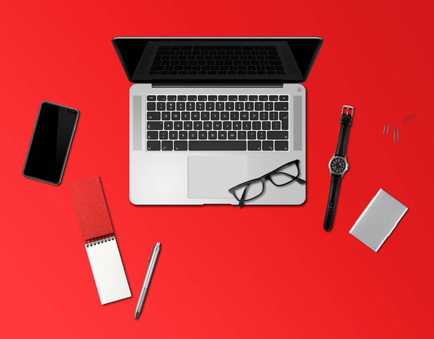 Office desk mockup top view isolated on red - Zdjęcie, obraz