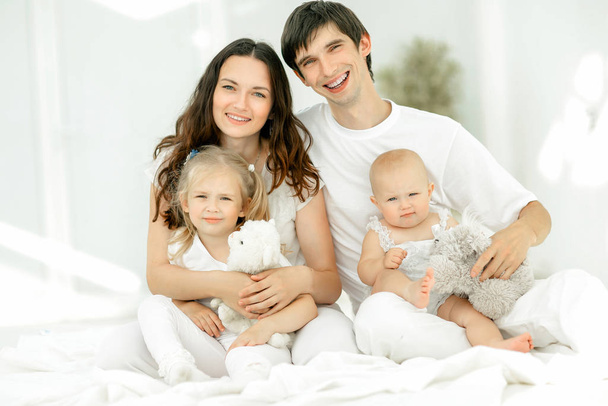 background image of a young happy family. - Фото, изображение