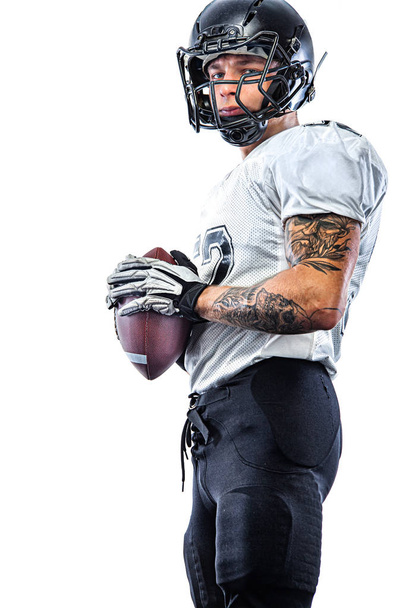 American football player in helmet isolated on white background. Sport wallpaper. - Fotó, kép