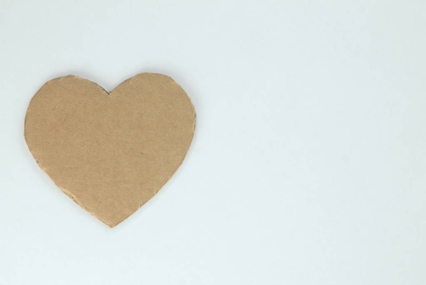 Cardboard heart on the background. - Foto, imagen