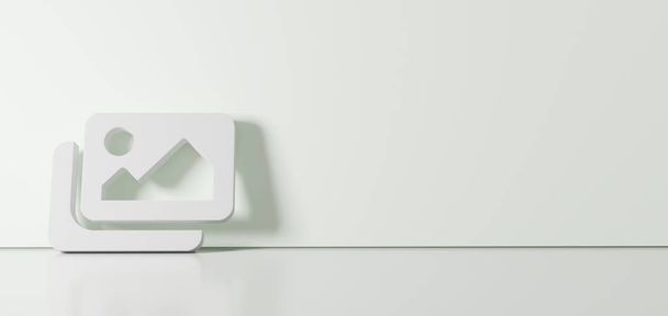 Rendering 3D del simbolo bianco dell'icona delle immagini appoggiata sulla parete a colori con riflesso del pavimento con spazio vuoto sul lato destro
 - Foto, immagini
