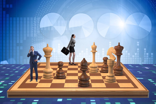 Businessman in large chess board in strategy concept - Photo, Image
