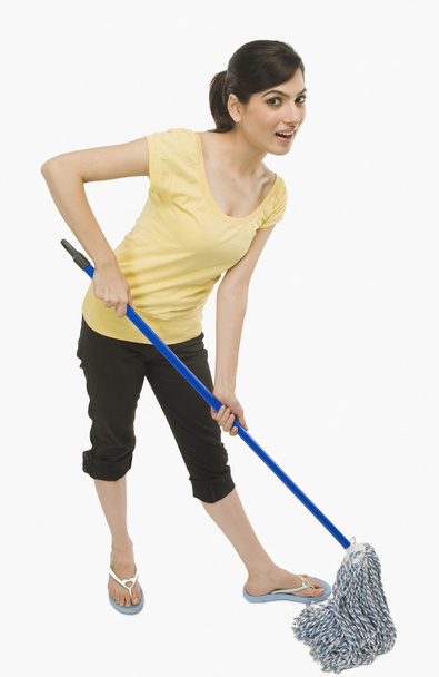 Woman cleaning floor with a mop - Фото, зображення