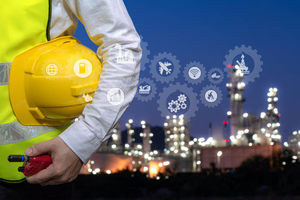 Engineer holding walkie talkie are working at refinery plant with icon connecting networking, Concept image - Photo, Image