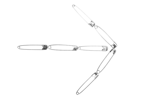 Arrow shape made of safety pins - Valokuva, kuva