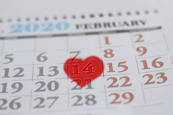 Valentine's Day 14 is marked on the calendar with a heart in red. Vacation concept - Photo, Image