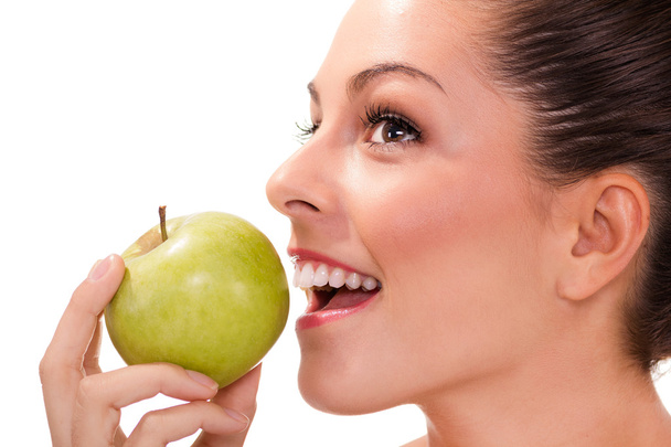 healthy woman eating green apple - Fotoğraf, Görsel
