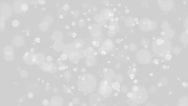 Animated glowing silver grey bokeh background with white flickering light particles. - Footage, Video