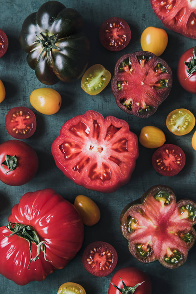 Fresh juicy tomatoes on background, close up. - Фото, зображення