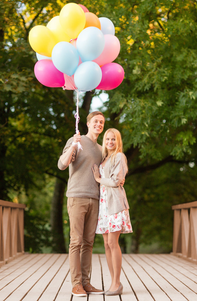 Couple with colorful balloons - Foto, Imagen