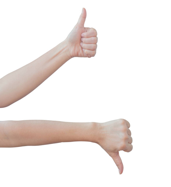 Weibliche Hand gestikuliert und zeigt auf weißem Hintergrund vereinzelt nach oben und unten. - Foto, Bild