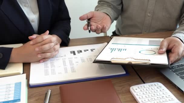 4k video of business man financial inspector and secretary making report, calculating or checking balance. Internal Revenue Service inspector checking document. Audit concept - Footage, Video