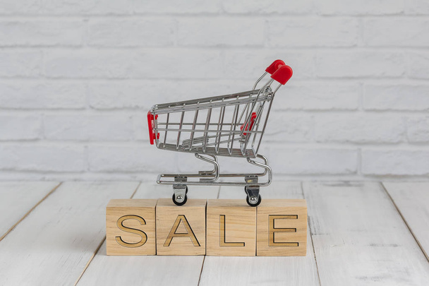 trolley on sale block ,  shopping concept - Photo, image