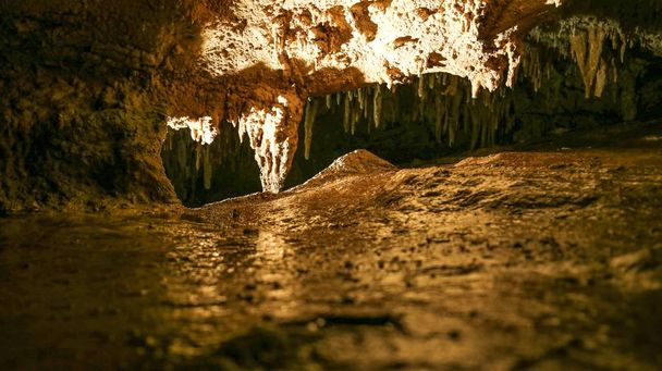 Luray Caverns,VA. Yellow backdrop. Stone texture. Usa travel. - Photo, Image