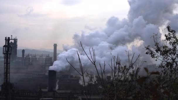  Industrial factory pollution atmosphere large smoke from chimneys near city unclean air poor visibility stuffy - Footage, Video