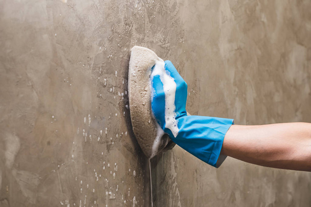 Cleaning on the concrete wall. - Photo, Image