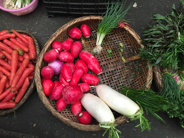 Fresh vegetables and fruits at local market - Fotoğraf, Görsel